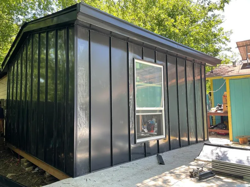 Black standing seam metal wall panels for Metal Roof Installation in Vinton